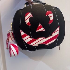 Backstitch Bruja Christmas Pumpkin Face purse/backpack in Black and Red